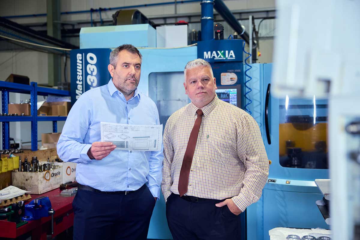 Shaun and Ryan Oracle's founders/directors talking through a project