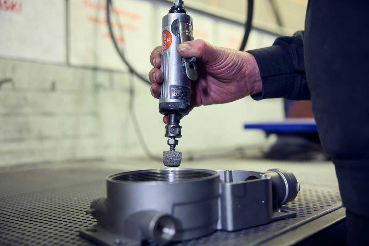 Steve deburring a complex component